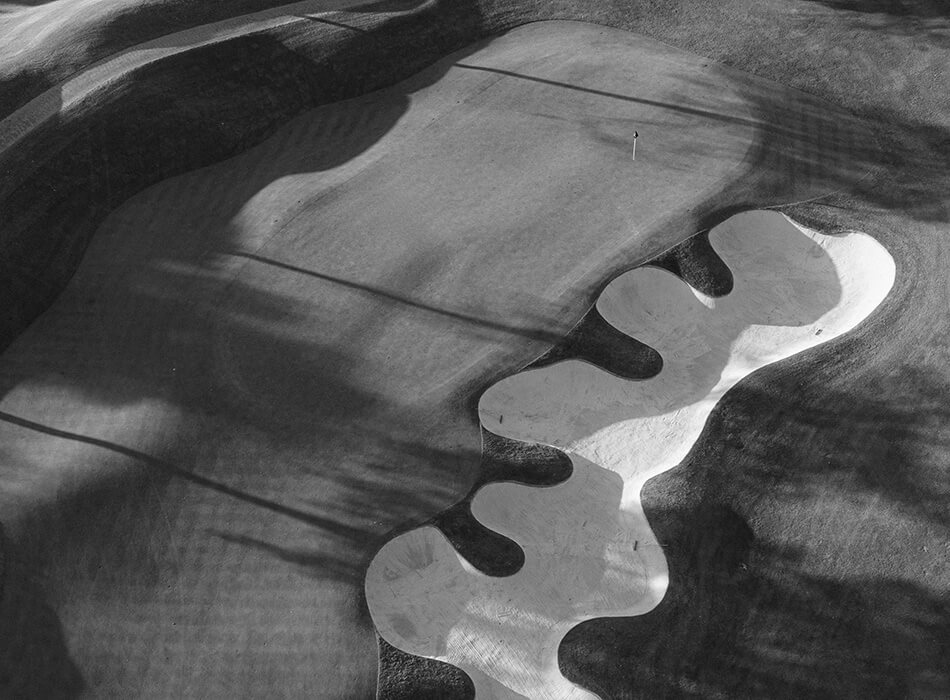 black and white image of golf course